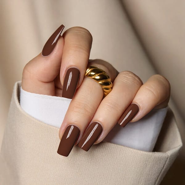 Medium square nails in a mocha brown with a glossy topcoat