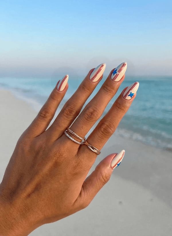 Creamy white base featuring hand-painted red stripes and blue star outlines