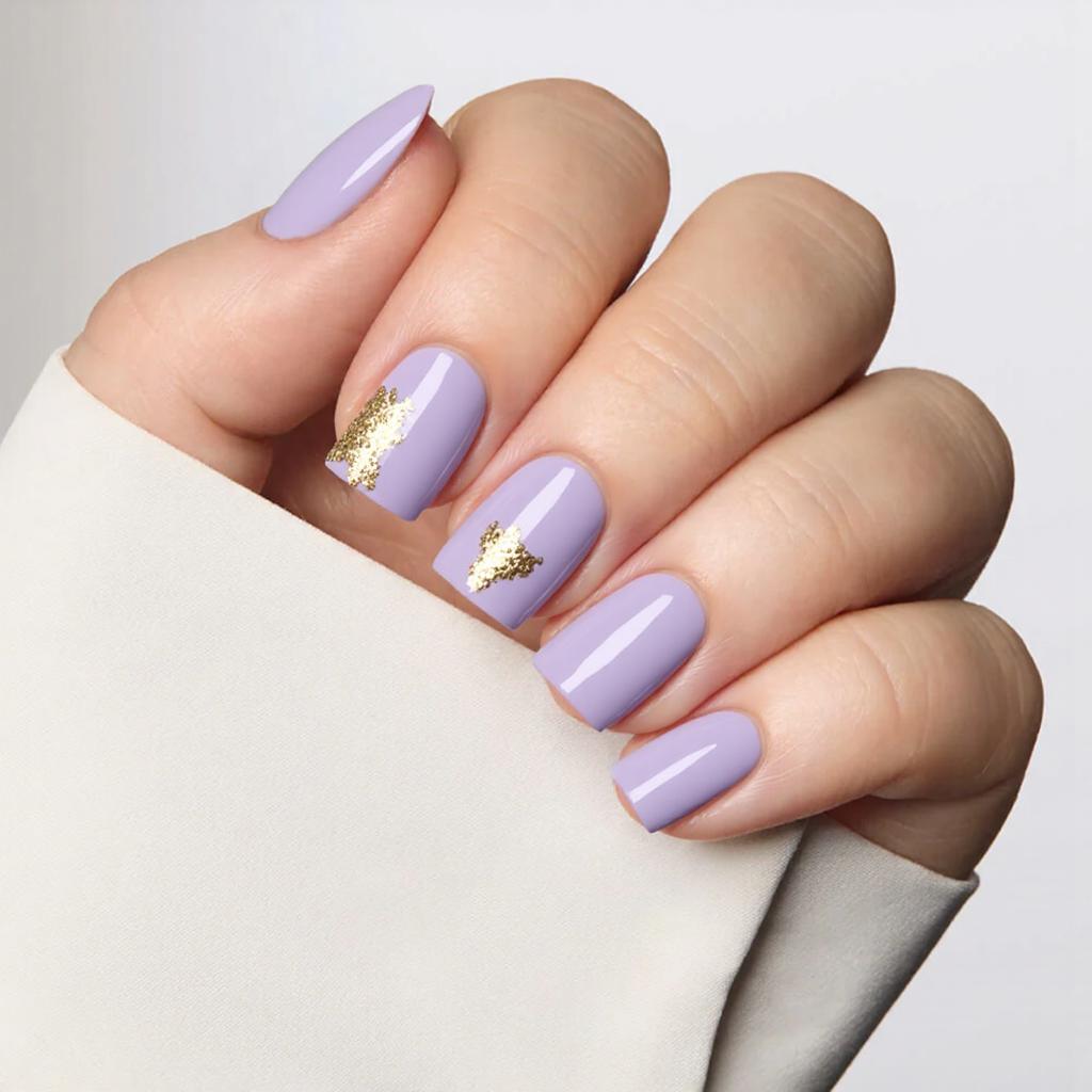Short square nails in a lavender shade, maybe add a delicate gold foil on one corner of each nail.