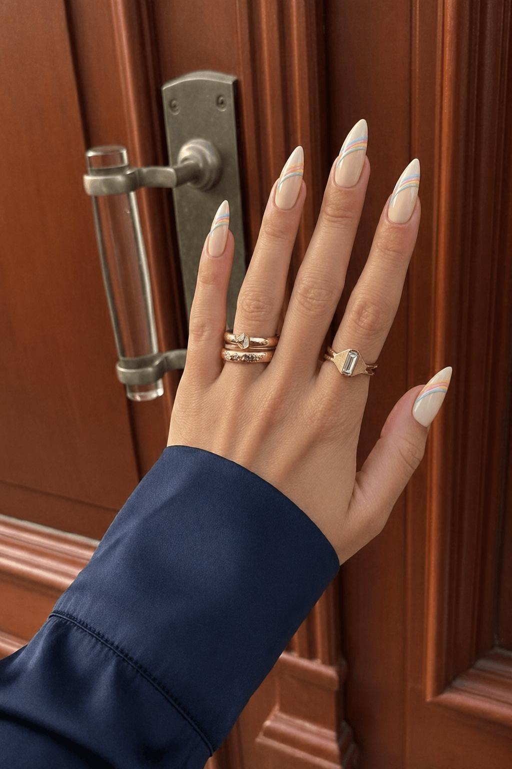 Creamy beige with pastel rainbow stripes as accents