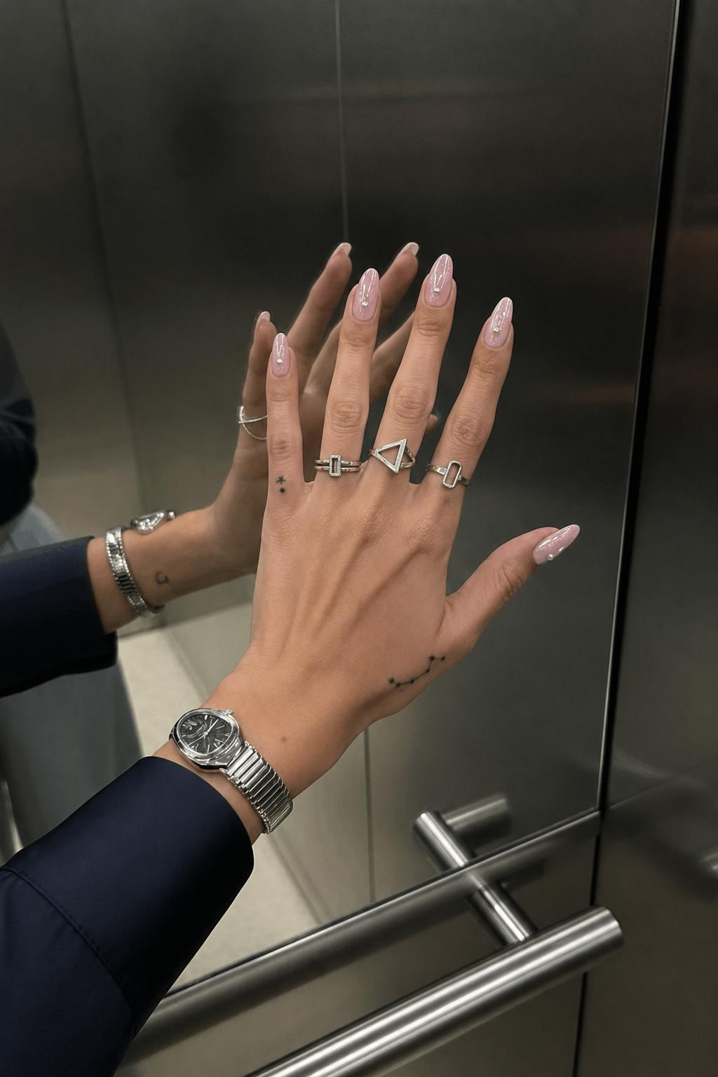 Baby pink with iridescent shimmer and dainty pearl details