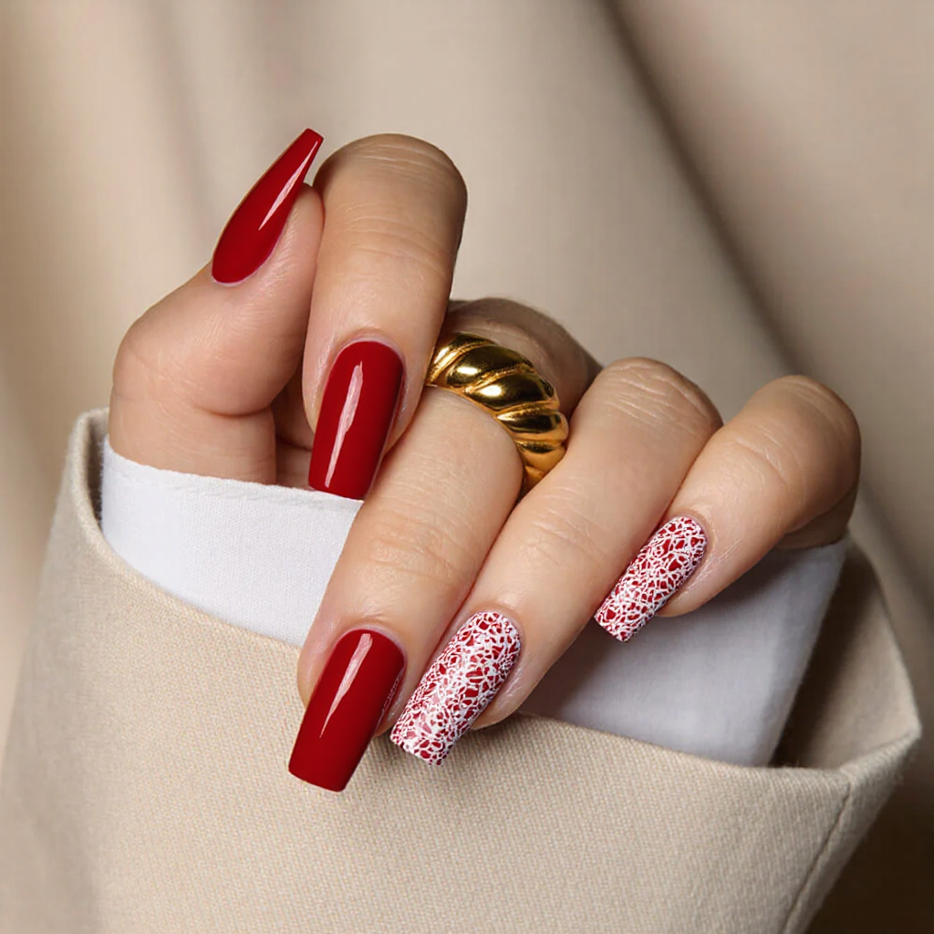 Medium square nails in a bright red with white lace designs, embodying the spirit of Valentine's Day.