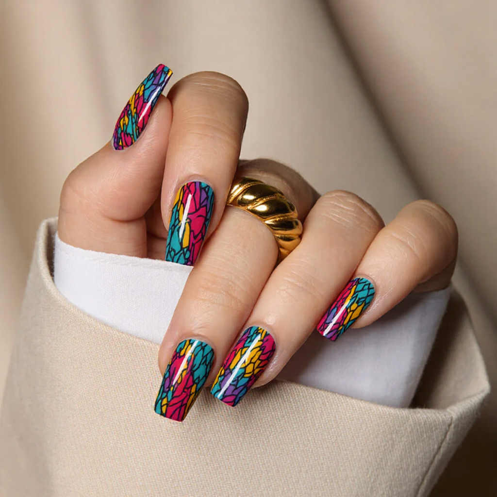 I want medium square nails with a vibrant, abstract geometric nail art pattern on each nail.