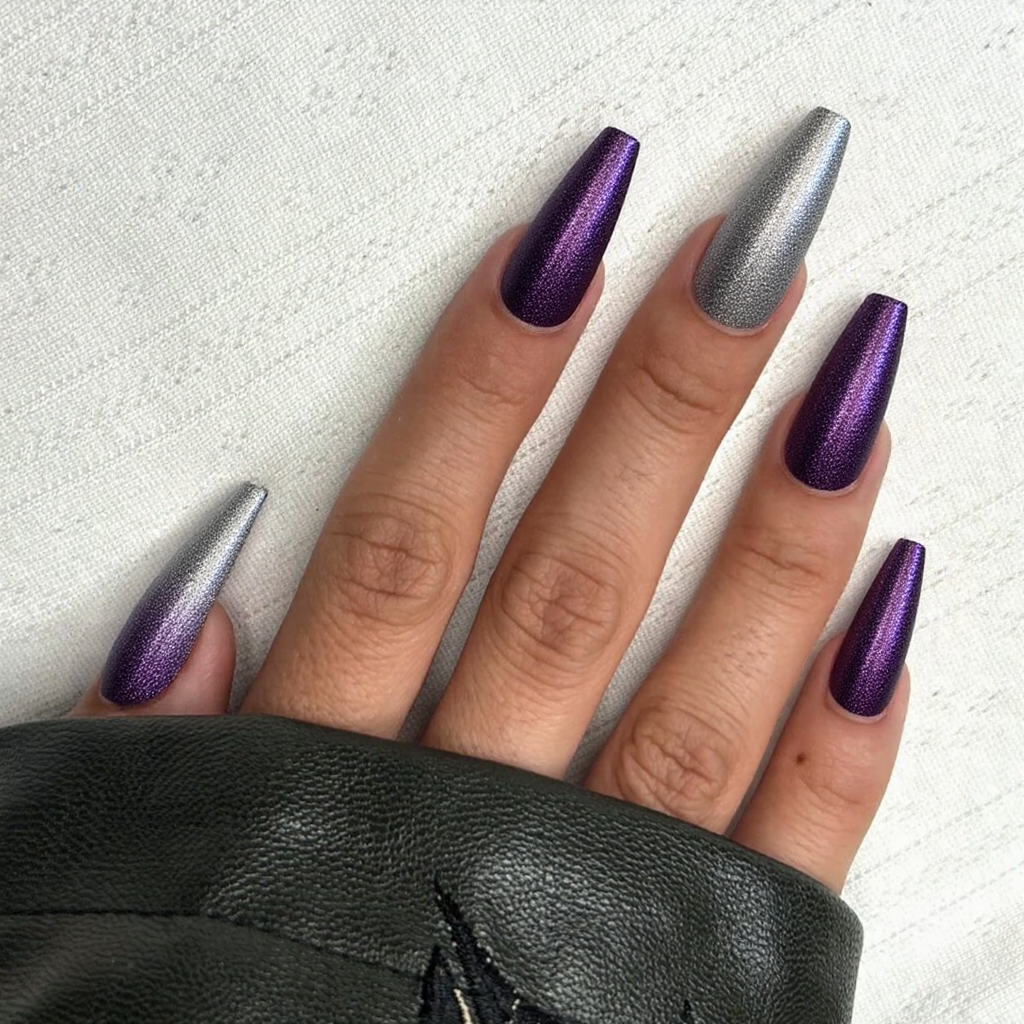 Long stiletto nails with a glamorous ombre from deep purple to shimmering silver for a night-out style.