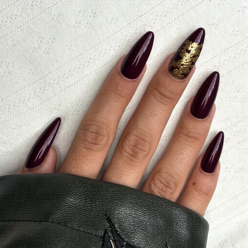 I'd love a deep burgundy stiletto mani with a glossy finish and a gold foil accent for a classic fall look.