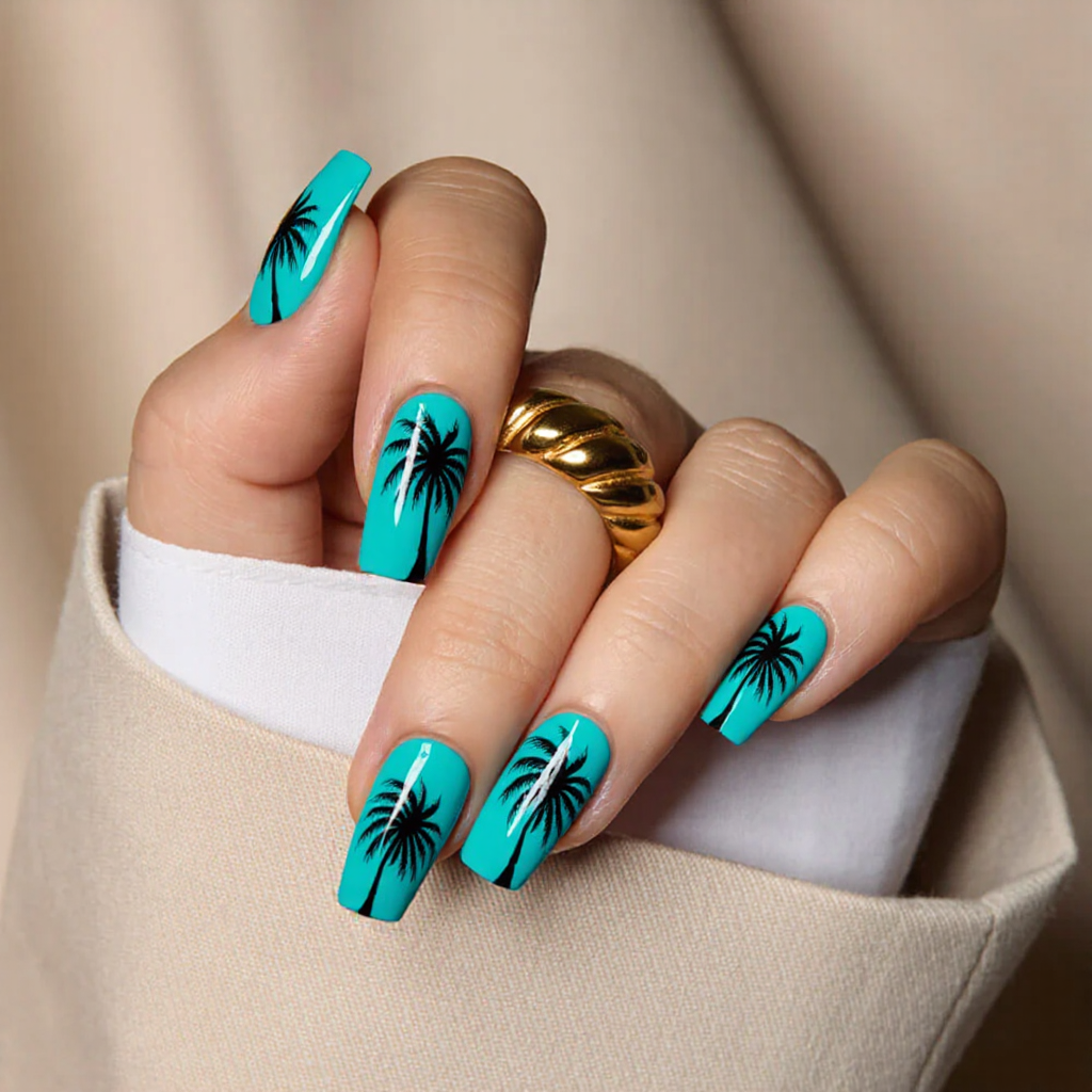 Medium square nails in a bright turquoise with palm tree silhouettes for a tropical getaway look.