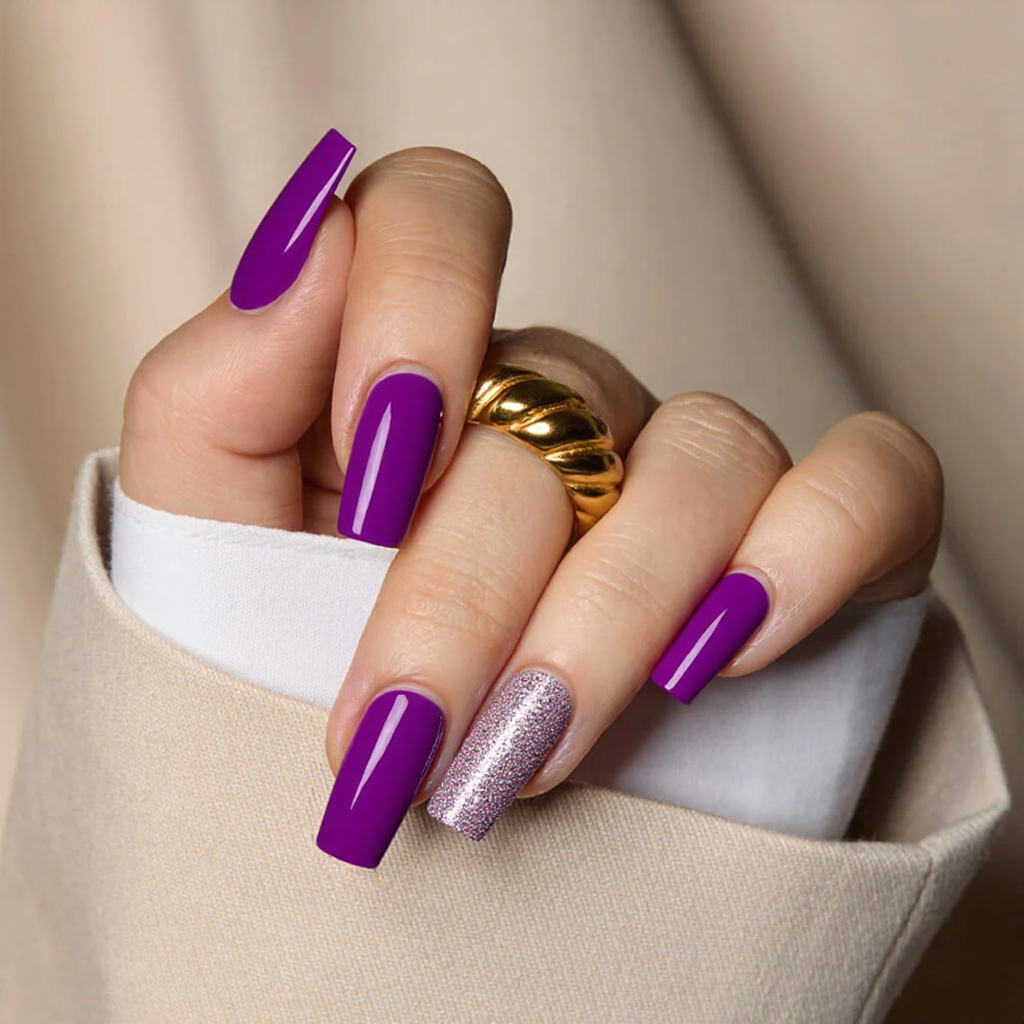 Medium square nails in a bright neon purple, complemented by a subtle glitter accent on the ring finger.