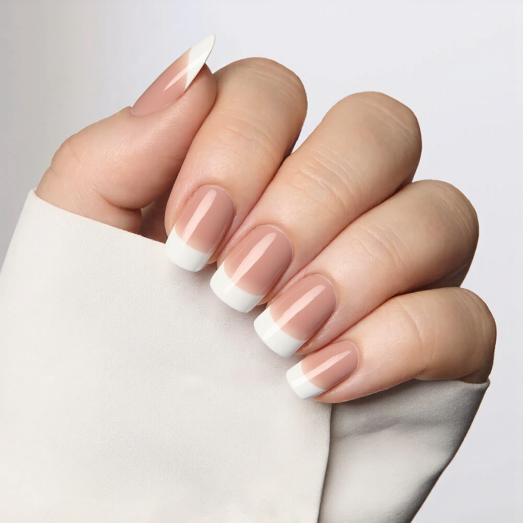 I'm looking for medium almond nails in a classy French ombre style—pink fading into white tips.