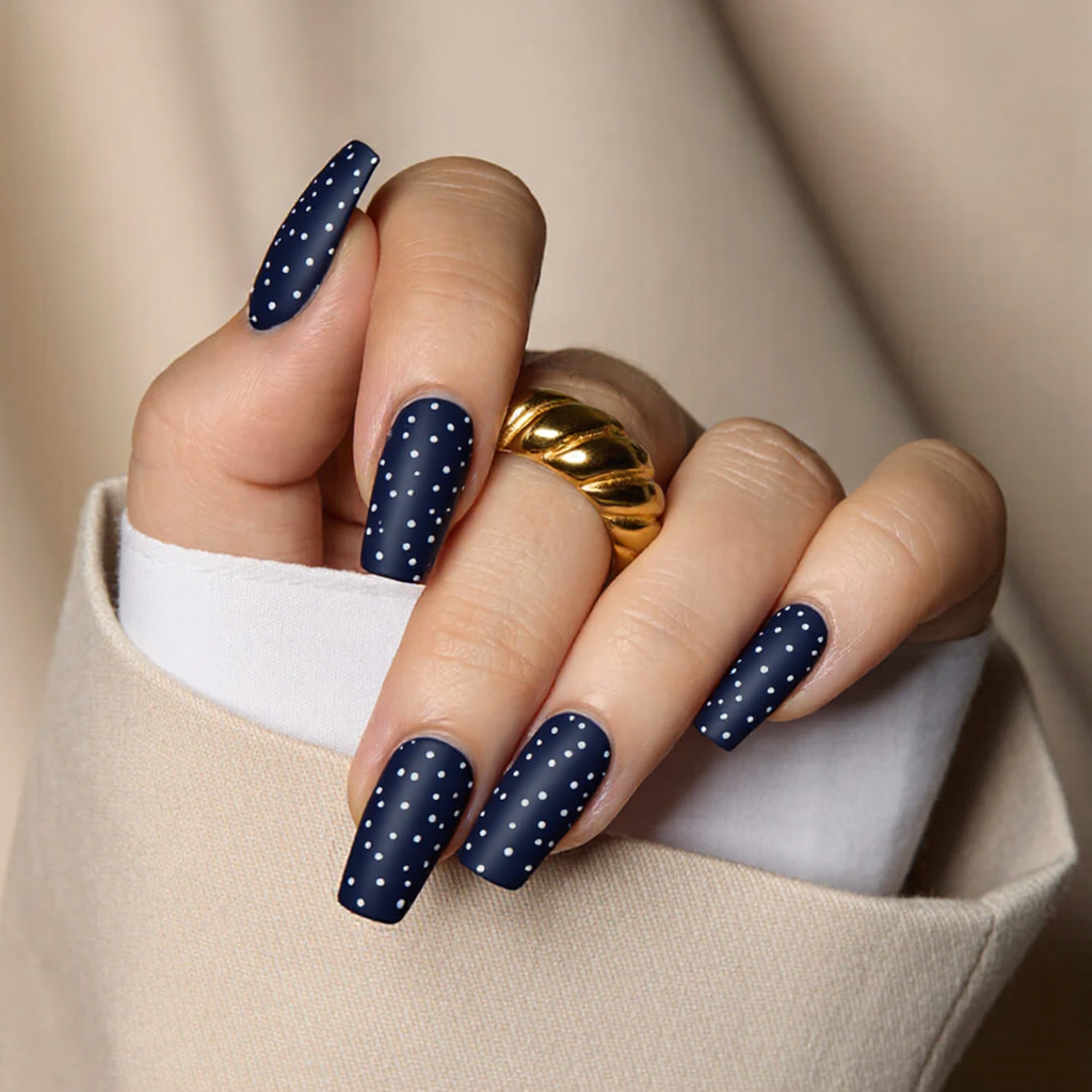 Please do medium square nails in a matte navy blue with minimal white dots to resemble falling snow.