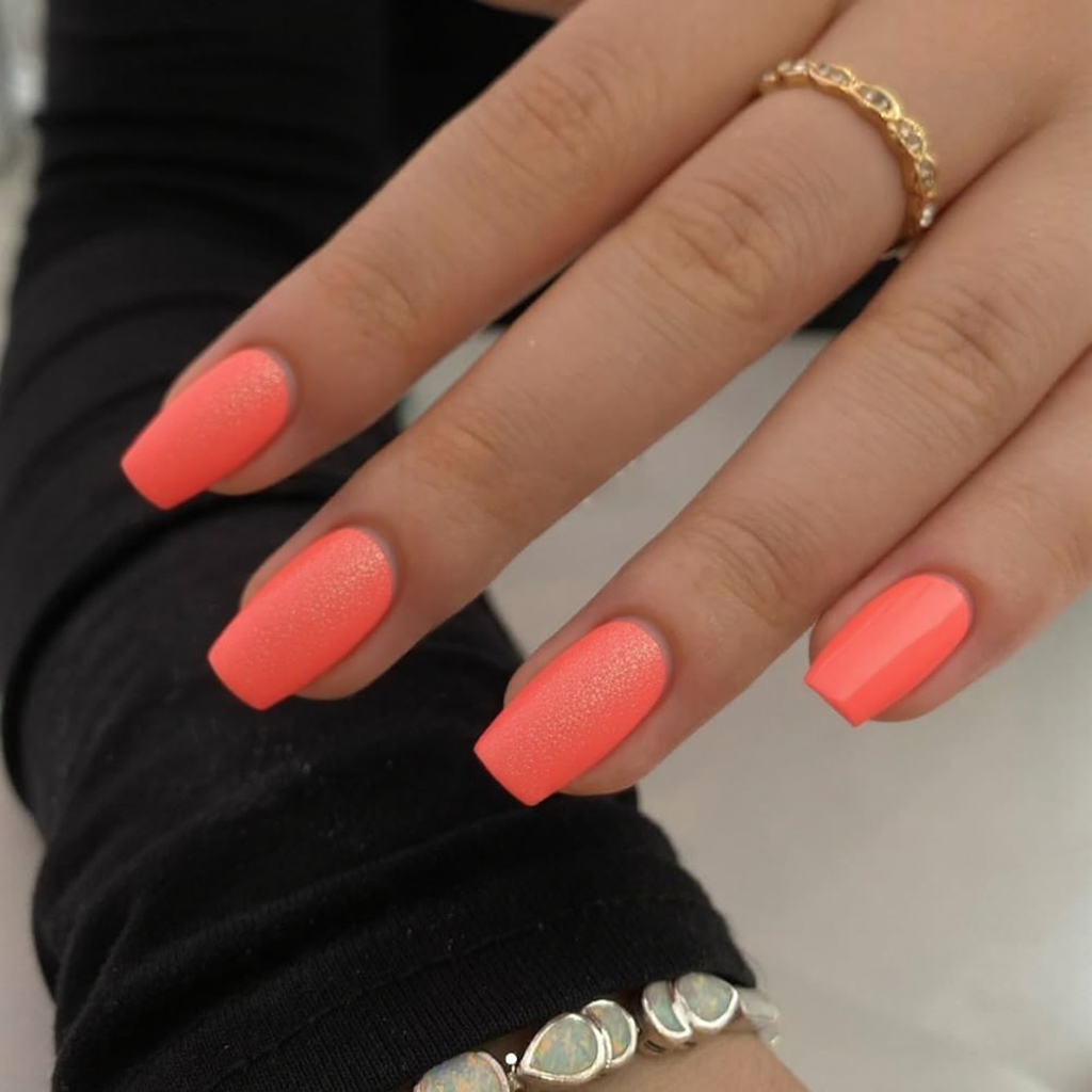 A short bright coral set with just a hint of shimmer on the ring finger would be perfect for summer.