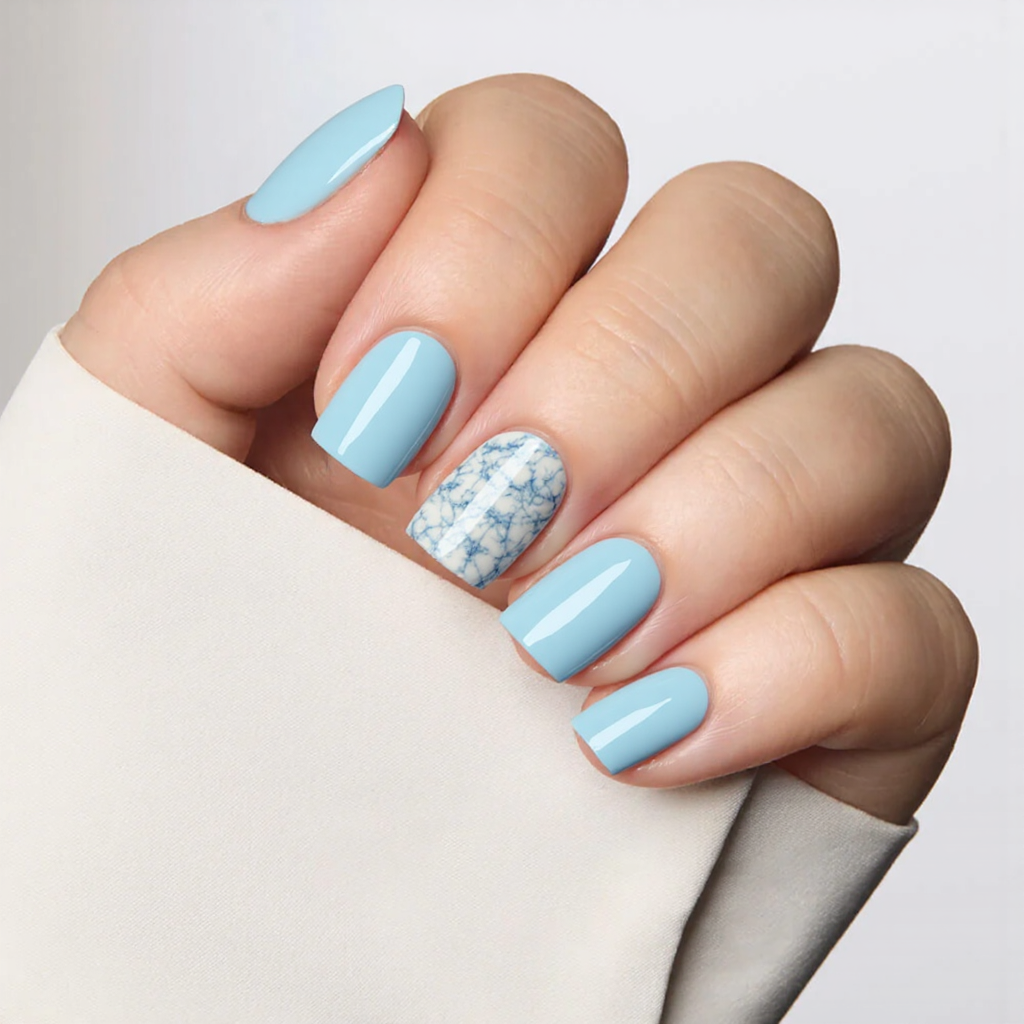 I want a short baby blue manicure, maybe with a single accent nail featuring a small marble pattern.