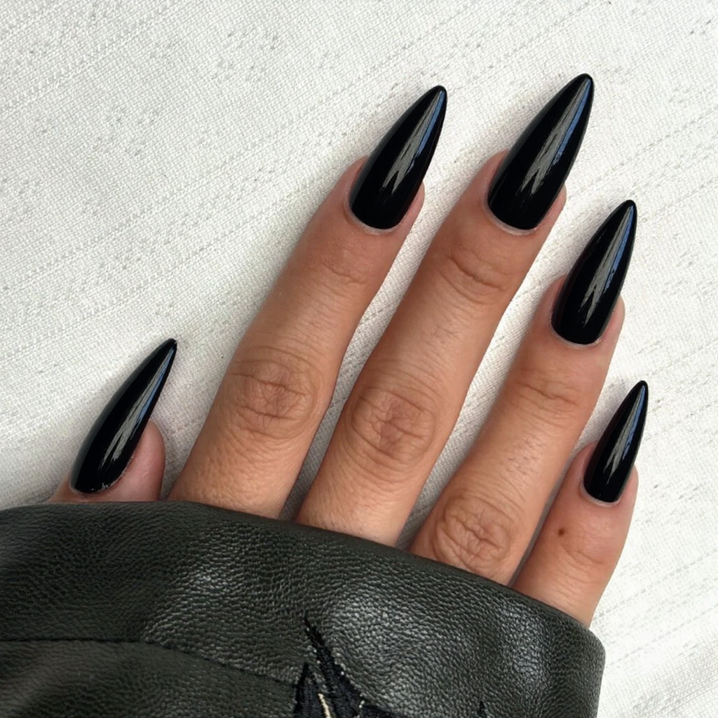 Long stiletto nails in a quick-dry black polish, easy and edgy with minimal effort.