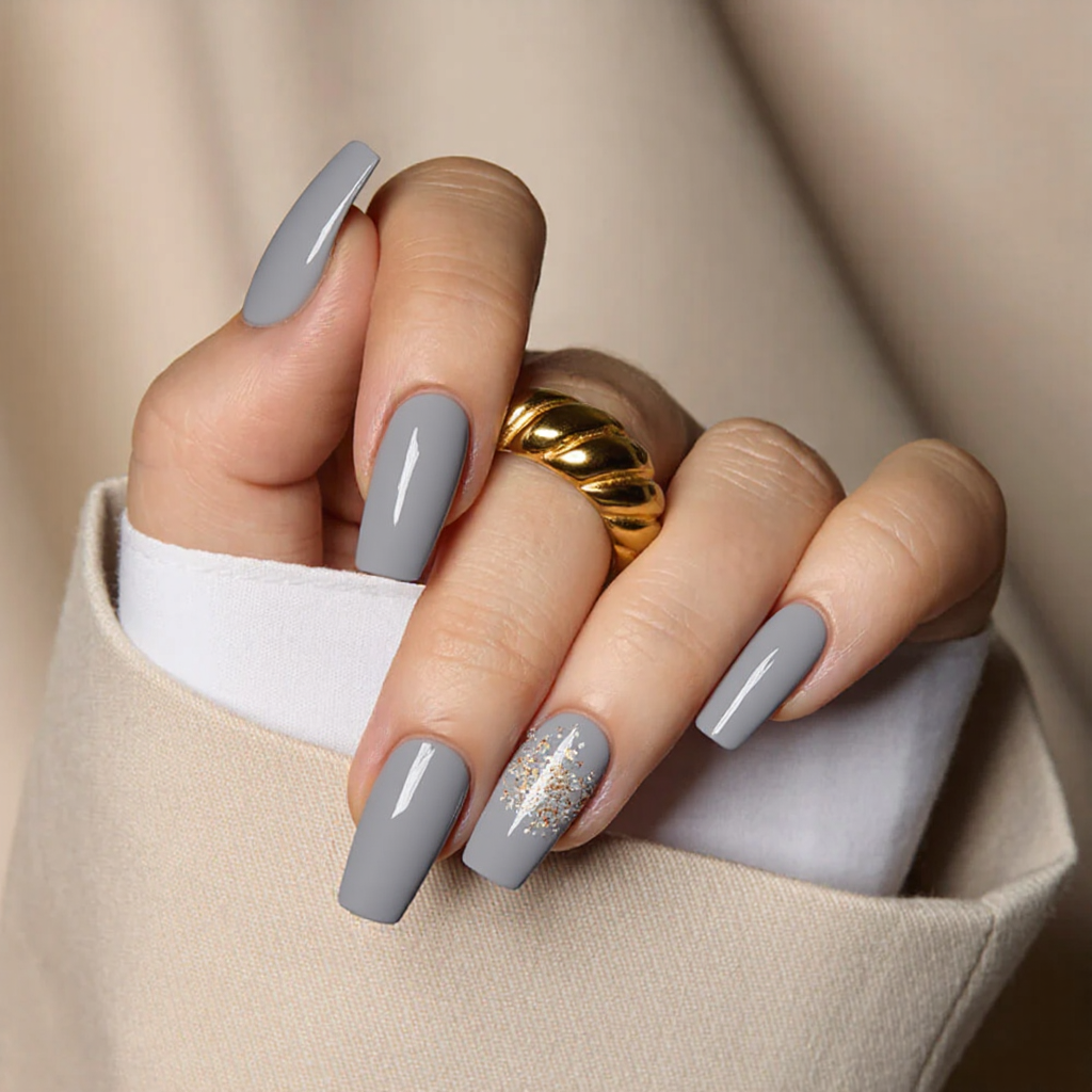 Medium square nails in a soft gray base, each ring finger featuring a delicate floral decal.