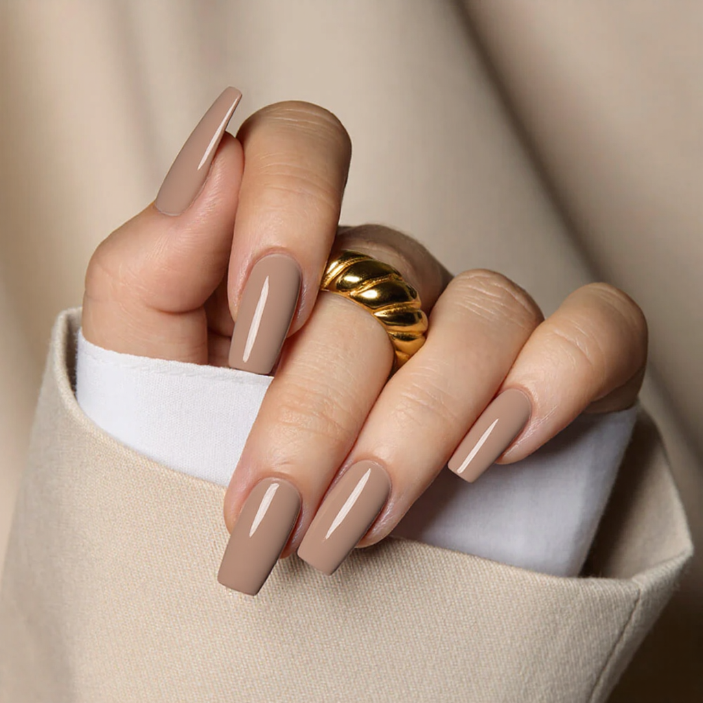 How about medium square nails in a nude color with a subtle thin white line near the tips?