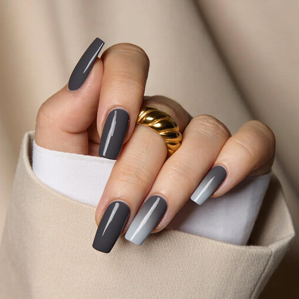 Medium square nails in a chic ombre from dark grey to silver, suitable for both casual and formal occasions.