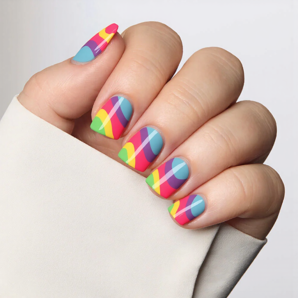 Short square nails featuring a minimal wave nail art design, each wave in a different bright hue.