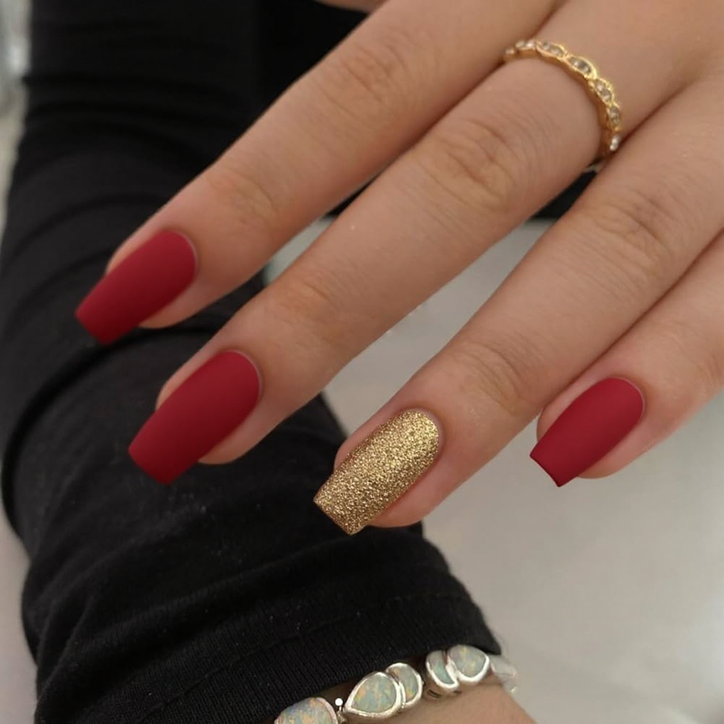 I'd love a short matte red manicure with a single gold glitter nail to add a pop of glam.