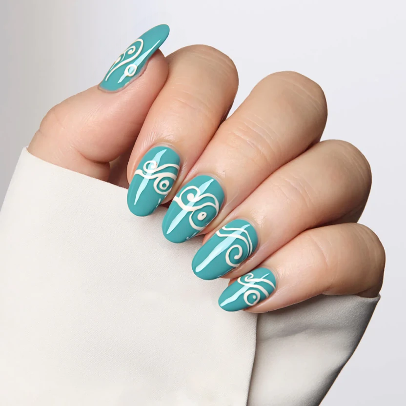 Nails featuring a serene base of soft teal blue, reminiscent of tranquil ocean waters, which covers the majority of the nails. The ring fingers showcase delicate, swirling white patterns, reminiscent of gentle ocean waves, elegantly sweeping from the cuticle to the tip, each wave curling gracefully. The remaining nails maintain their calming teal hue, creating a harmonious and balanced look. A glossy finish enhances the design, reflecting light like the sun on water, perfectly complementing the almond shape’s graceful curves while evoking the essence of a relaxing day at the beach.
