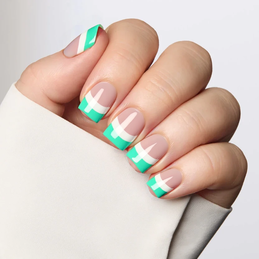 Nails designed with a natural builder gel base, showcasing a flawless, transparent finish that highlights the nail's health and shine. Each short square nail features an elegantly rounded French tip painted in a very light summer green, adding a fresh and understated touch. The French line is soft and delicate, gracefully enhancing the nail's natural beauty without overpowering it. This minimalistic yet sophisticated design captures the essence of summer and is perfectly suited for the refined look of short square nails.