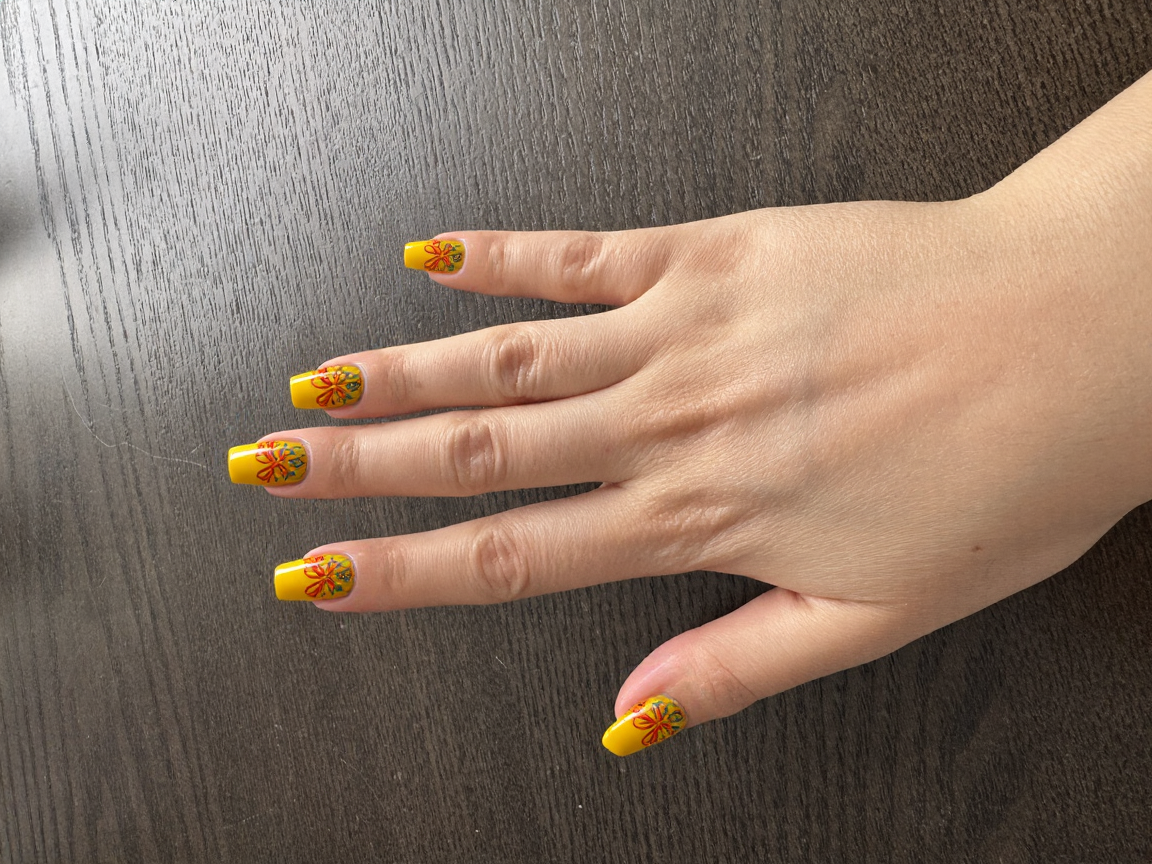 Nails featuring a dreamy 70s-inspired color palette, with a rich mustard yellow base on the majority, complemented by accents of avocado green and burnt orange. The ring fingers are adorned with elegant, swirling retro patterns in burnt orange that gracefully curve towards the tips, while the middle fingers showcase simple geometric shapes in avocado green, subtly placed for a balanced look. A glossy finish enhances the vibrant colors, creating a playful yet sophisticated aesthetic that perfectly complements the dramatic, pointed shape of long stiletto nails.